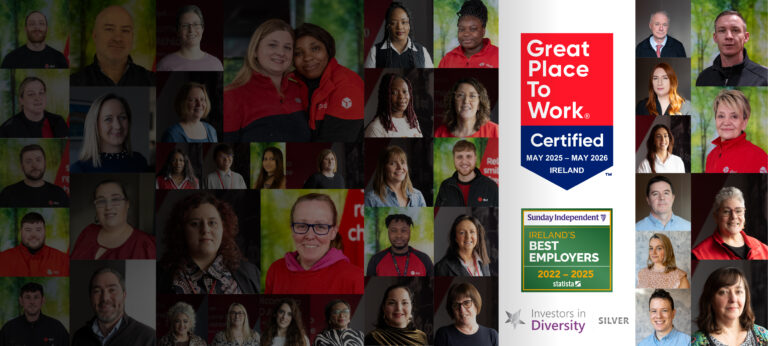 Employees of DPD Ireland together, smiling in the workplace